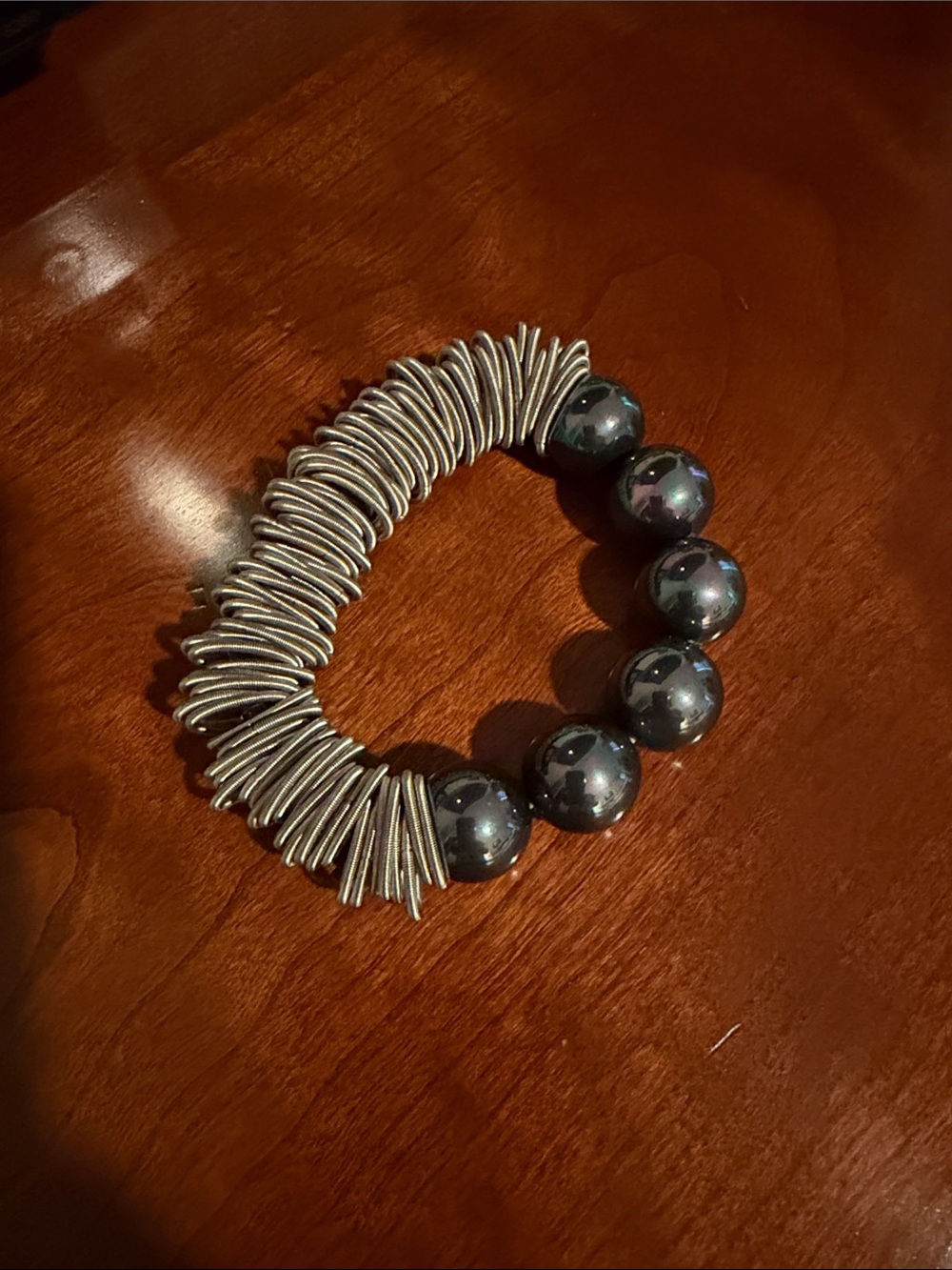 Elegant Hematite Bead and Silver-Tone Coil Stretch Bracelet